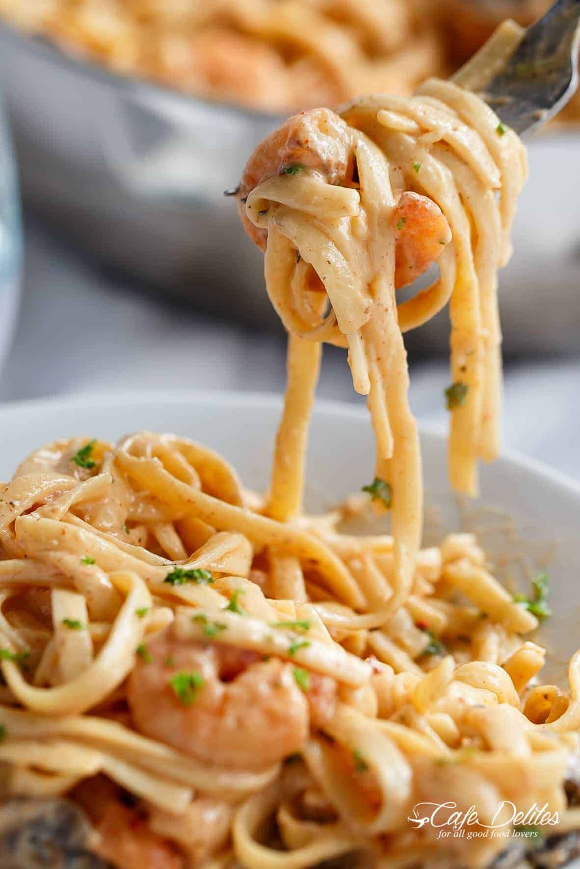 Shrimp Pasta in a creamy garlic parmesan Alfredo sauce! | cafedelites.com