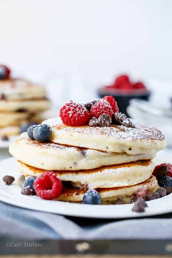 Fluffy Greek Yoghurt Mixed Berry Choc Chip Pancakes | https://cafedelites.com