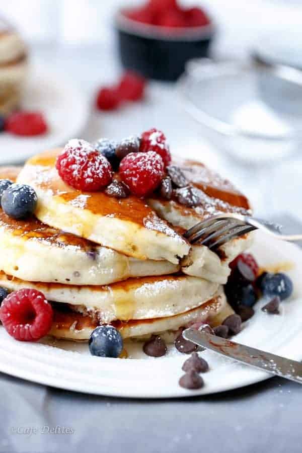 Fluffy Greek Yoghurt Mixed Berry Choc Chip Pancakes | https://cafedelites.com