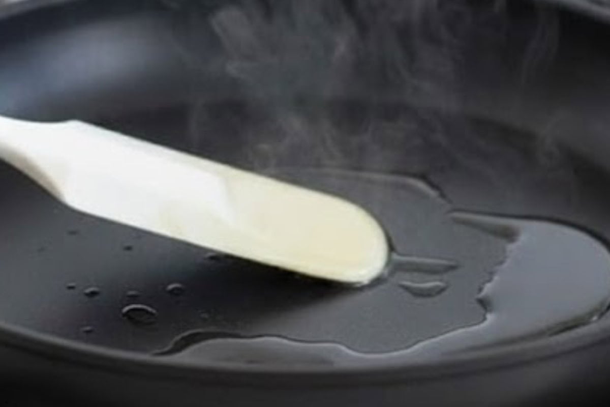 Heat a nonstick pan or griddle over medium heat and lightly spray with cooking oil. Spread evenly with a spatula.