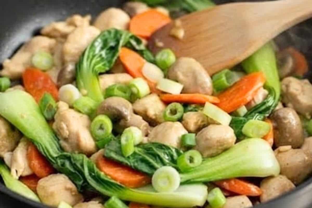 Stir in the bok choy and mushrooms