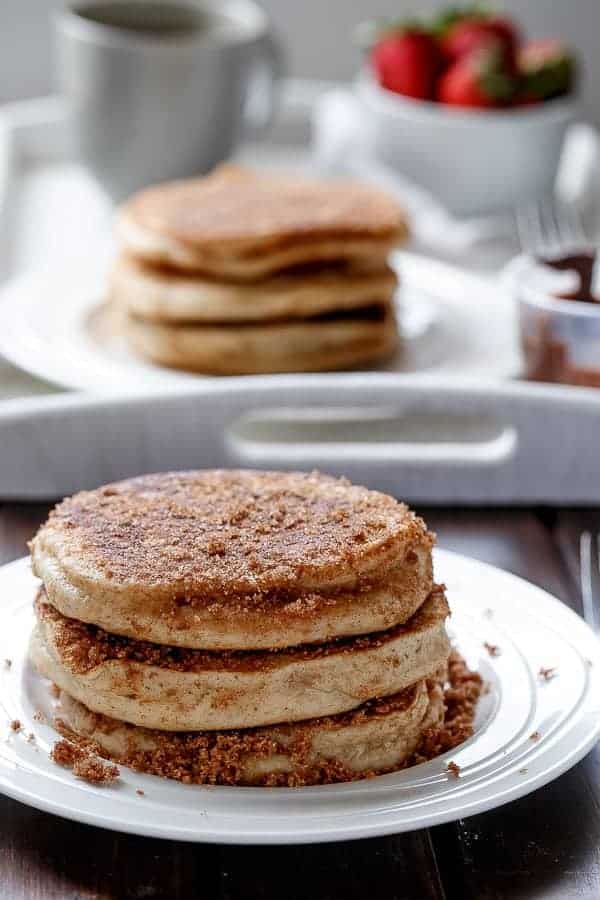 Nutella Stuffed Cinnamon Sugar Donut Pancakes | https://cafedelites.com