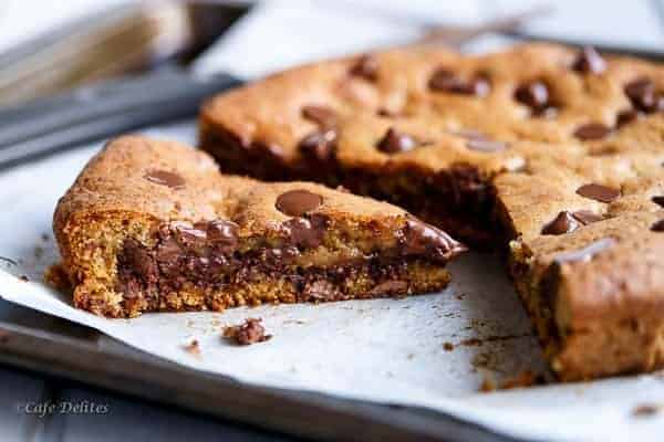 Nutella Stuffed Deep Dish Skillet Cookie | https://cafedelites.com