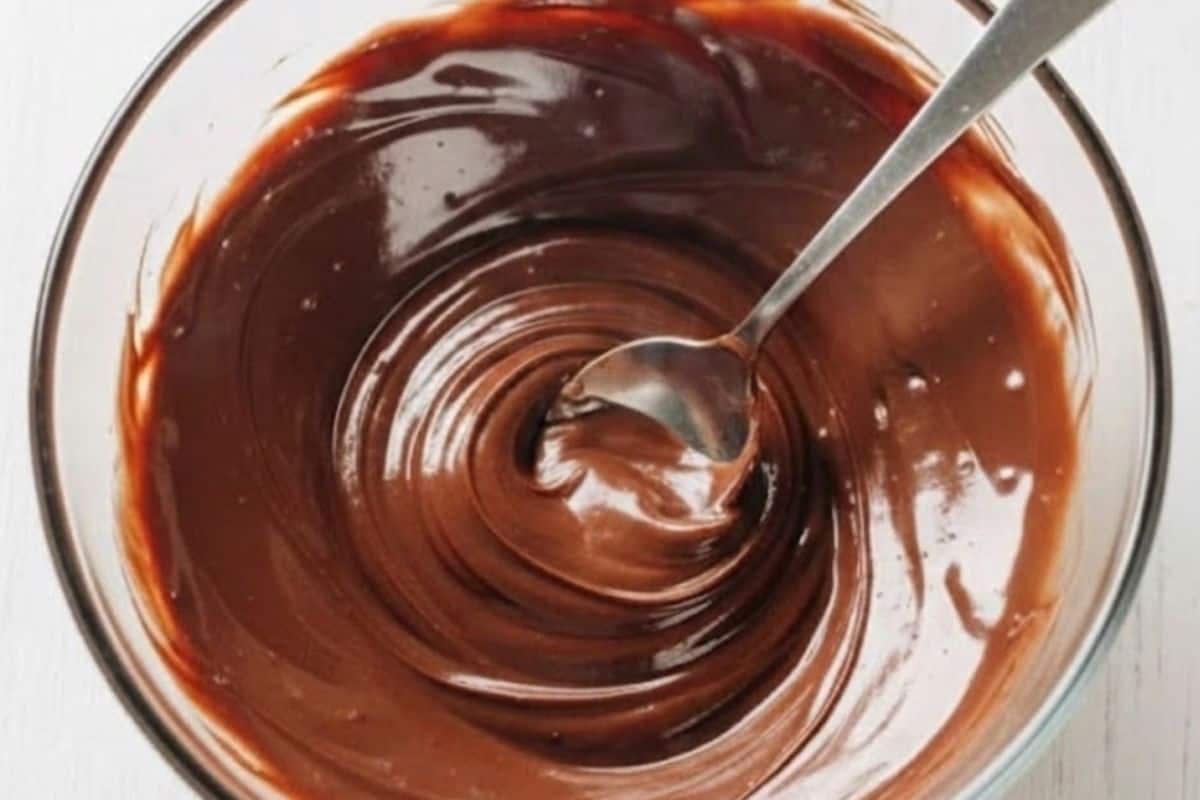 Heat the nutella in the microwave.