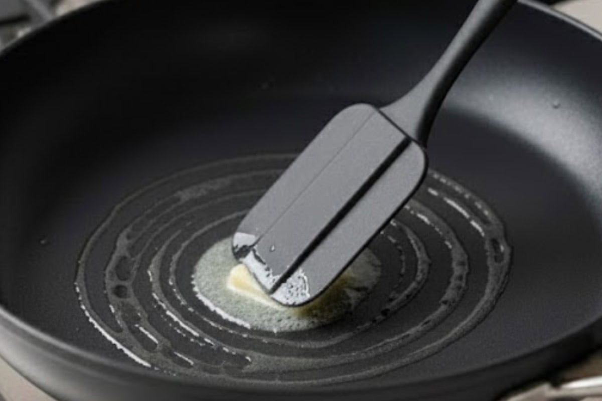 Lightly grease the nonstick pan with a small amount of butter or oil.