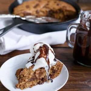 Peanut Butter Choc Chip Deep Dish Skillet Cookie piece on a plate