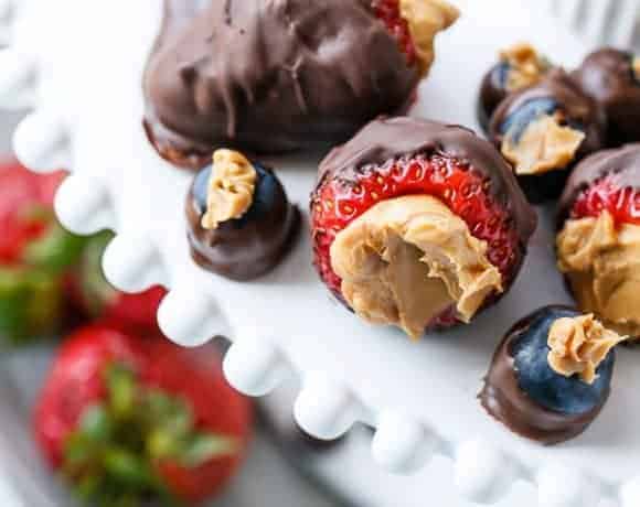 Peanut Butter Stuffed Chocolate Covered Berries | https://cafedelites.com