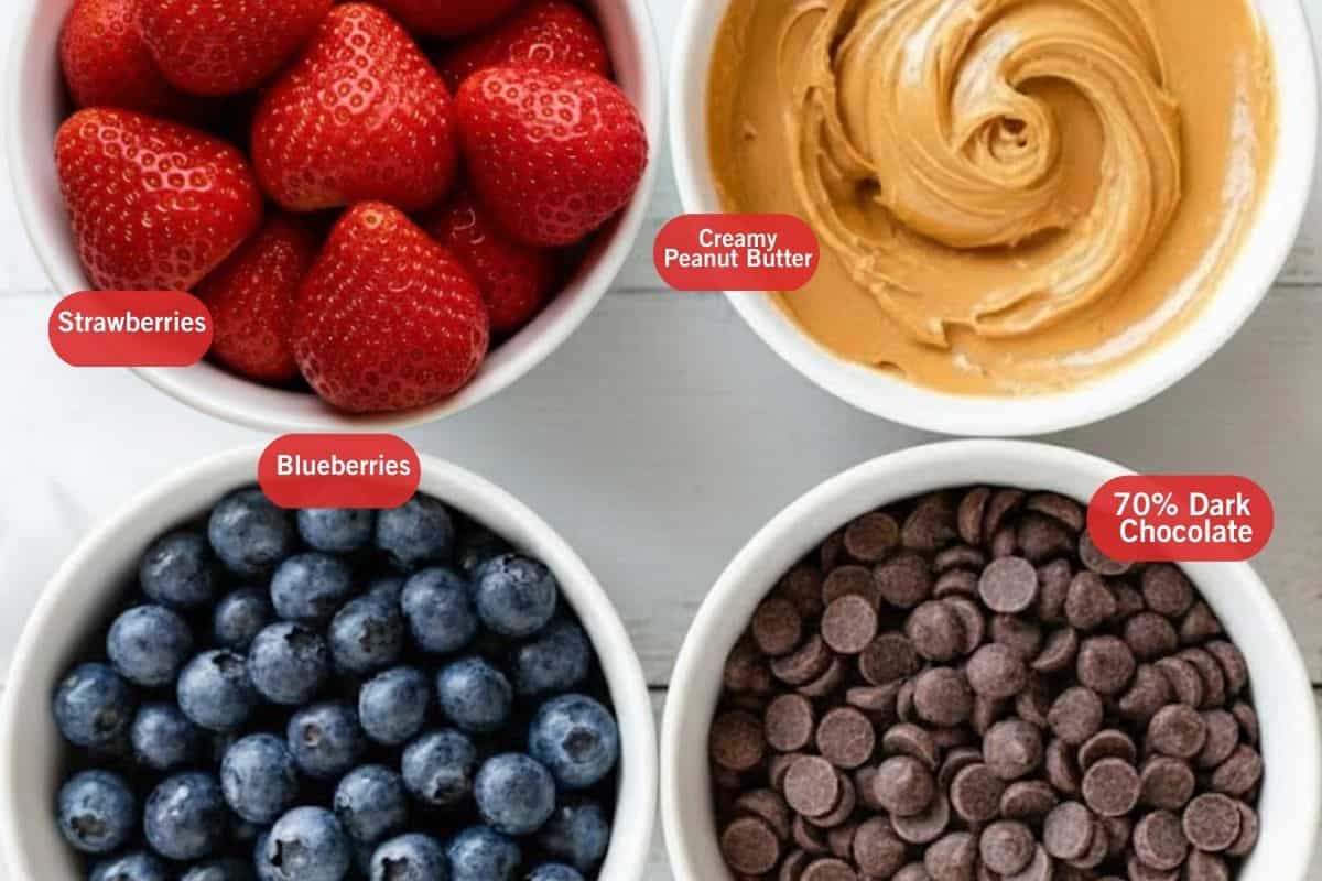 Flat lay photo of ingredient shot of 
strawberries, creamy peanut butter, blueberries, 70%dark chocolate. - 2