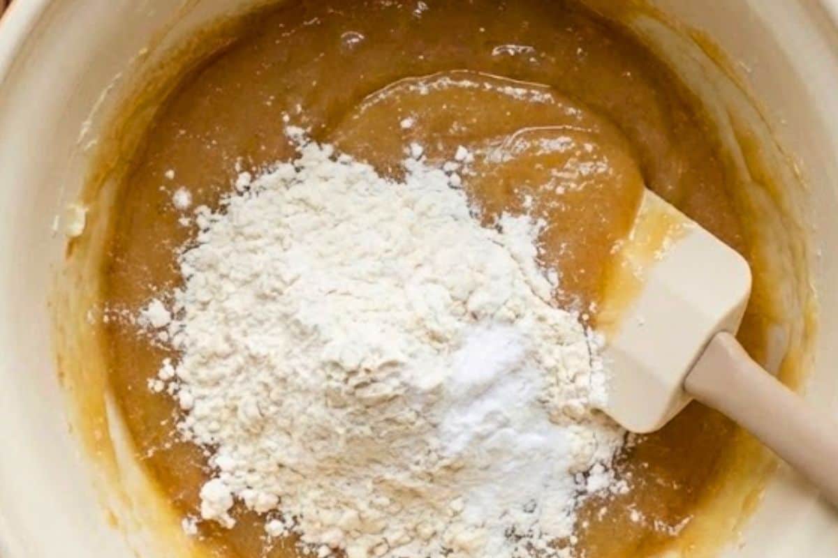 Stir in the flour, baking soda, and sal and mix gently - 6