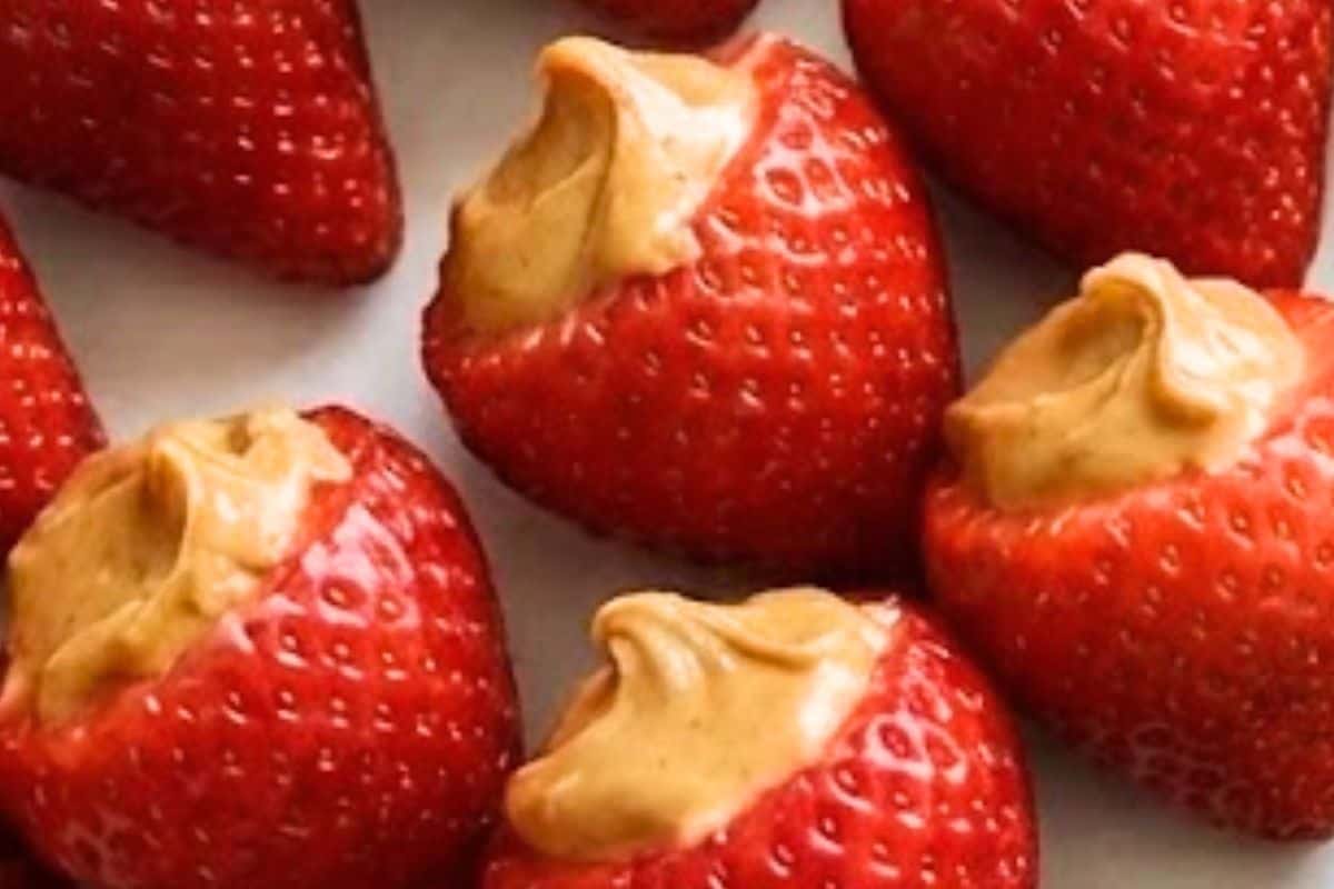 Wash and dry all berries thoroughly, hull the strawberries, then fill each with about ¼ to ½ teaspoon peanut butter  - 3