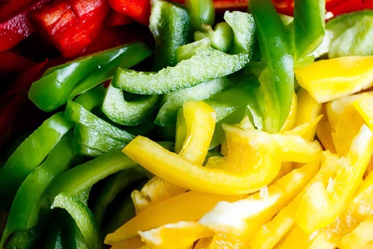 Add the sliced peppers and onion to the remaining marinade - 5