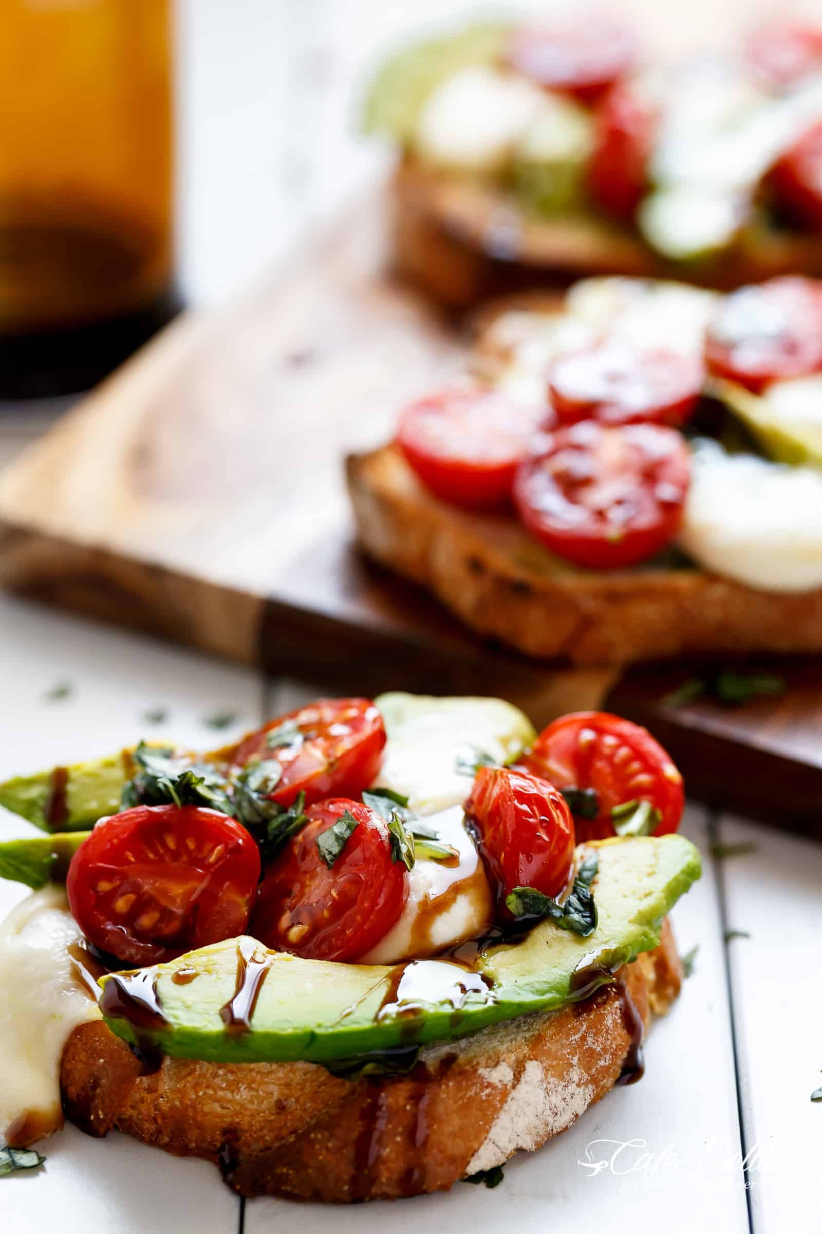 Grilled Avocado Caprese Crostini are the ultimate EASY appetizers infused with olive oil and piled high with Caprese flavours!