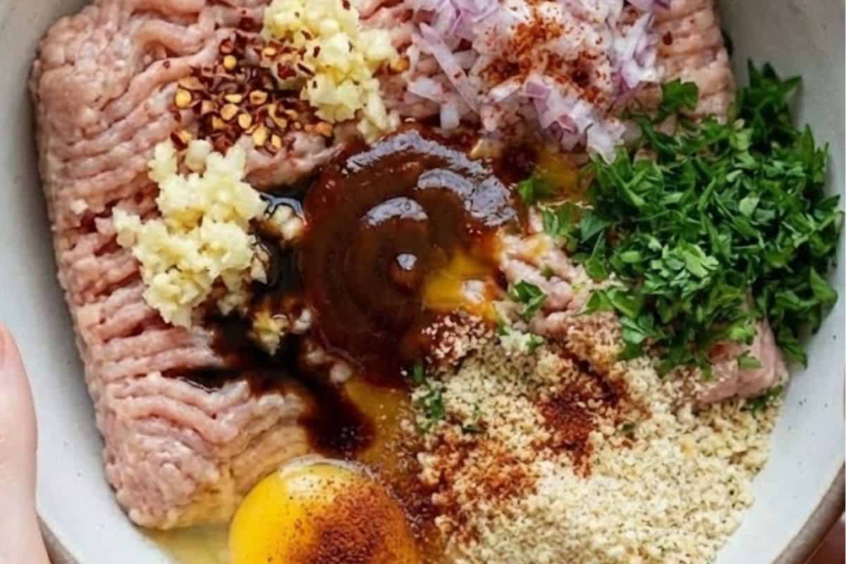 Combine the turkey, garlic, onion, egg, sauces, breadcrumbs, parsley, and spices in a large bowl - 3