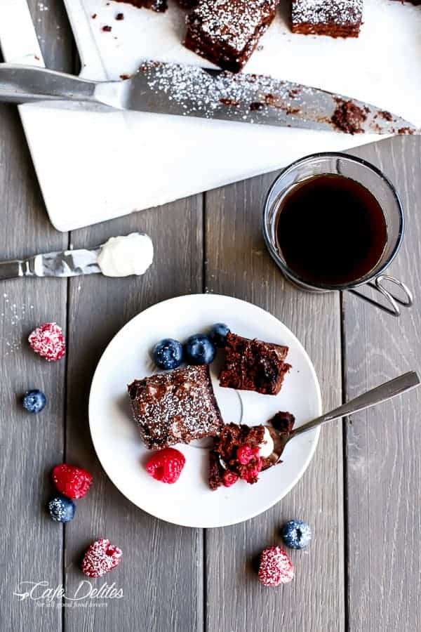 Sweet blueberries and tart raspberries baked into a chocolate Nutella brownie filled with  Mixed Berry Nutella Brownies