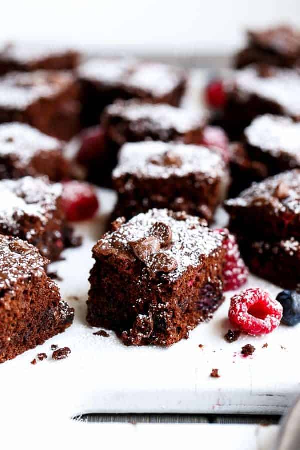 Sweet blueberries and tart raspberries baked into a chocolate Nutella brownie filled with  Mixed Berry Nutella Brownies