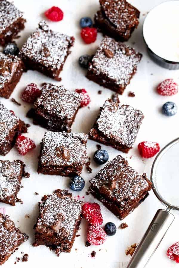 Sweet blueberries and tart raspberries baked into a chocolate Nutella brownie filled with  Mixed Berry Nutella Brownies