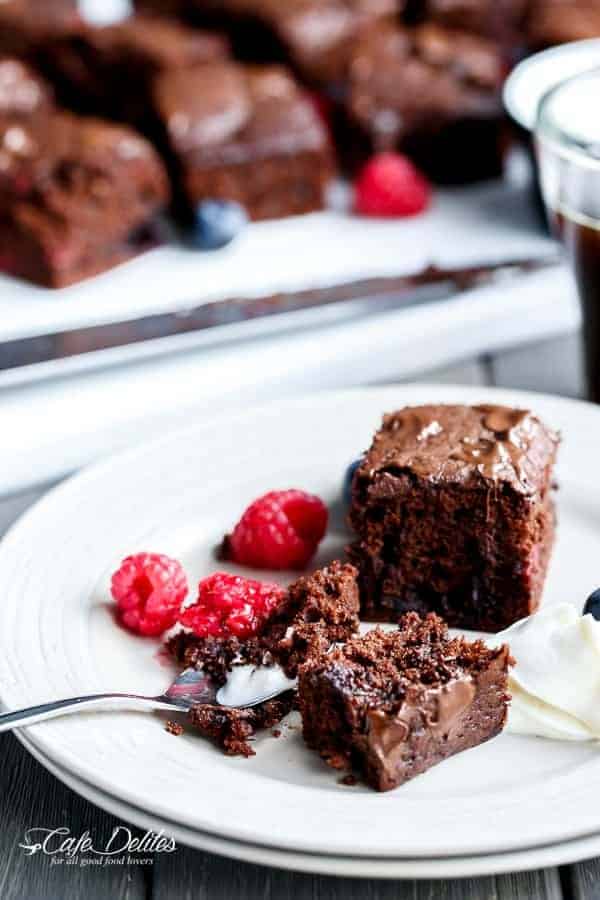 Sweet blueberries and tart raspberries baked into a chocolate Nutella brownie filled with  Mixed Berry Nutella Brownies