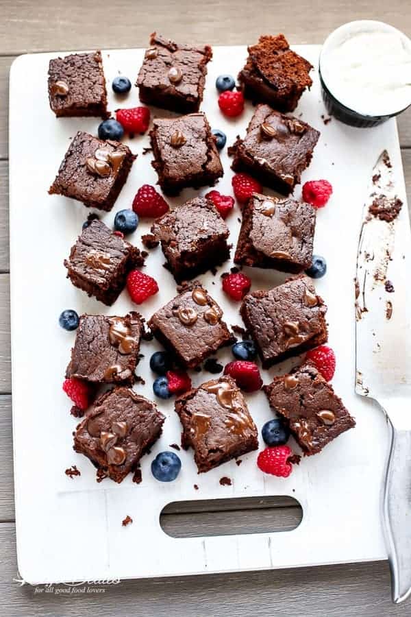 Sweet blueberries and tart raspberries baked into a chocolate Nutella brownie filled with  Mixed Berry Nutella Brownies