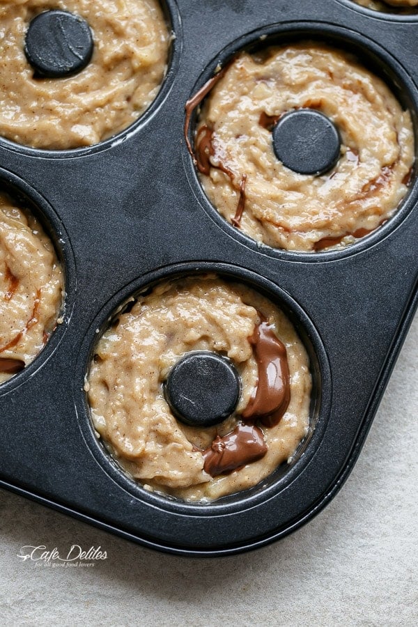 Nutella Stuffed Baked Banana Bread Donuts | https://cafedelites.com