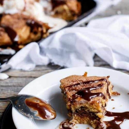 Nutella Stuffed Deep Dish Chocolate Chip Skillet Cookie - Cafe Delites