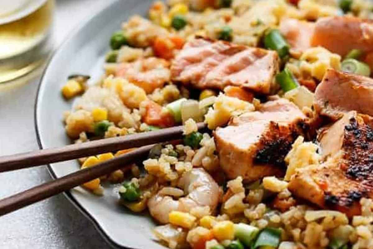 Close-up shot of Seared Salmon and Prawn Rice.