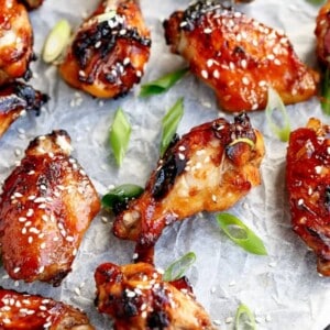 Sticky Honey Sesame Chicken Wings on a baking tray