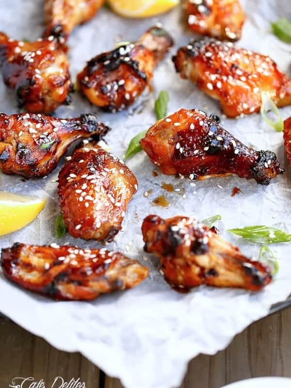 Sticky Honey Sesame Chicken Wings on a baking tray
