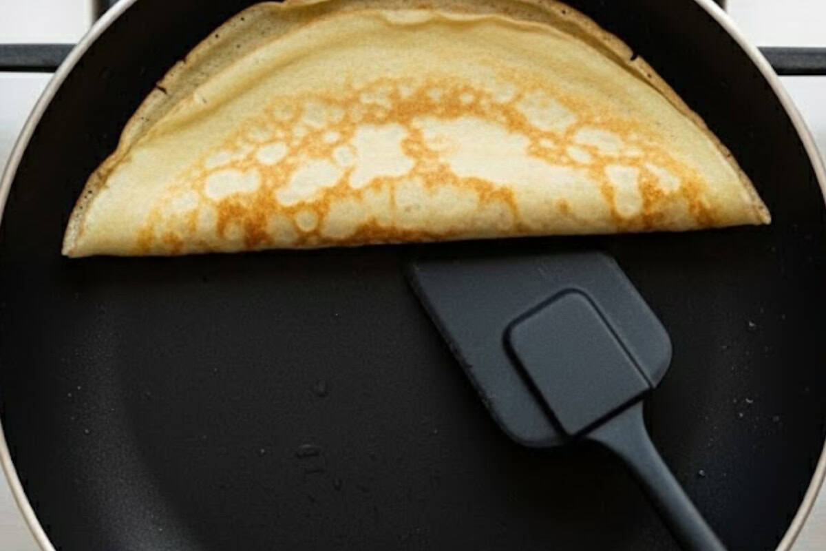 Gently lift the edges with your fingers or a spatula