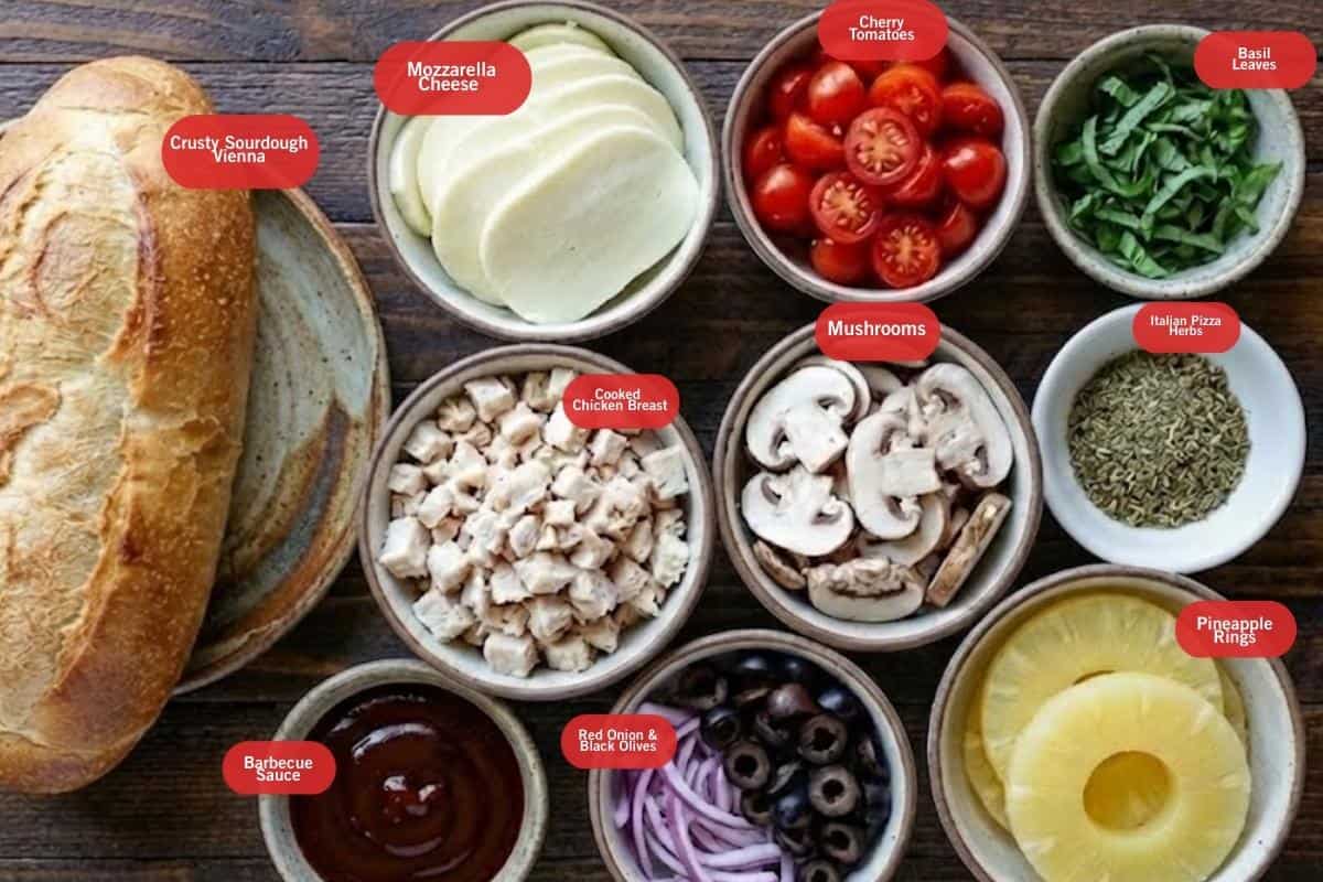 Flat lay photo of ingredient shot of crust sourdough Vienna, mozzarella cheese, cherry tomatoes, basil leaves, Italian pizza herbs, mushrooms, cooked chicken breast, barbecue sauce, red onion and black olives, pineapple rings - 2