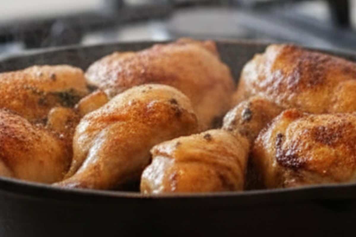 Searing the chicken in pan. - 6