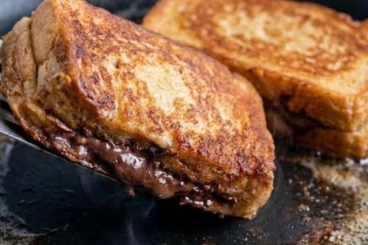 Fry the slices in batches until golden on both, ensuring centers are warm and the chocolate has melted - 8