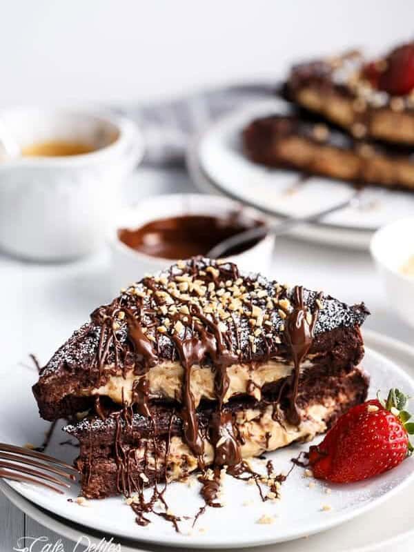 Chocolate brownie peanut butter cheesecake stuffed french toasts on a plate