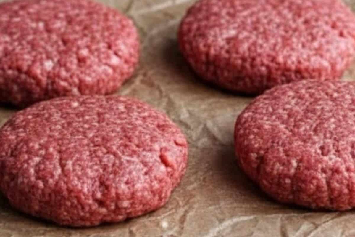 Divide the mixture into four equal portions and form each one into a firm, round patty about 1 inch thick.