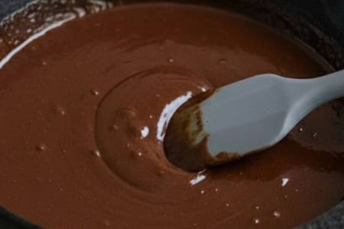 Combine butter and chocolate in the skillet and melt over low heat until smooth. Allow to cool slightly, then transfer to a heatproof bowl. - 4