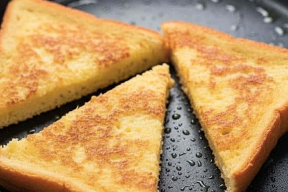 Heat a nonstick pan or griddle over medium heat. Cook the soaked bread slices for a few minutes per side until golden brown. - 5