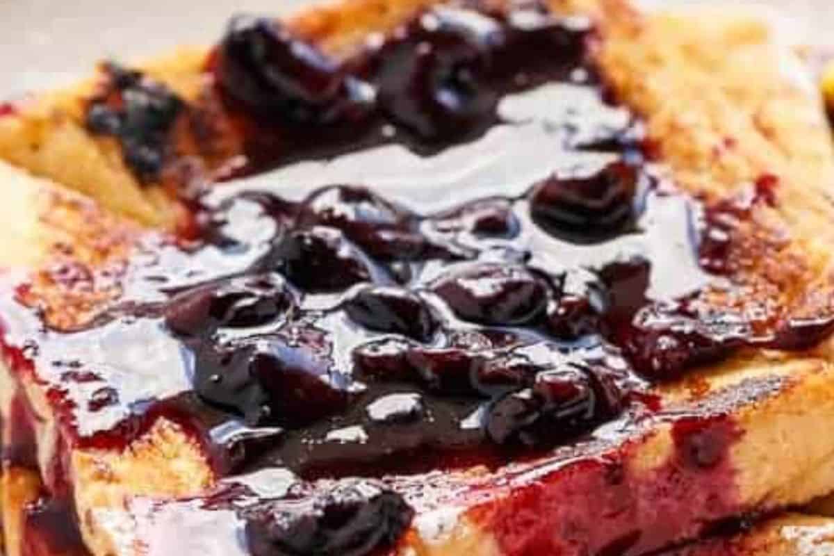 Prepare the blueberry sauce. Drizzle the warm sauce over the French toast. - 6