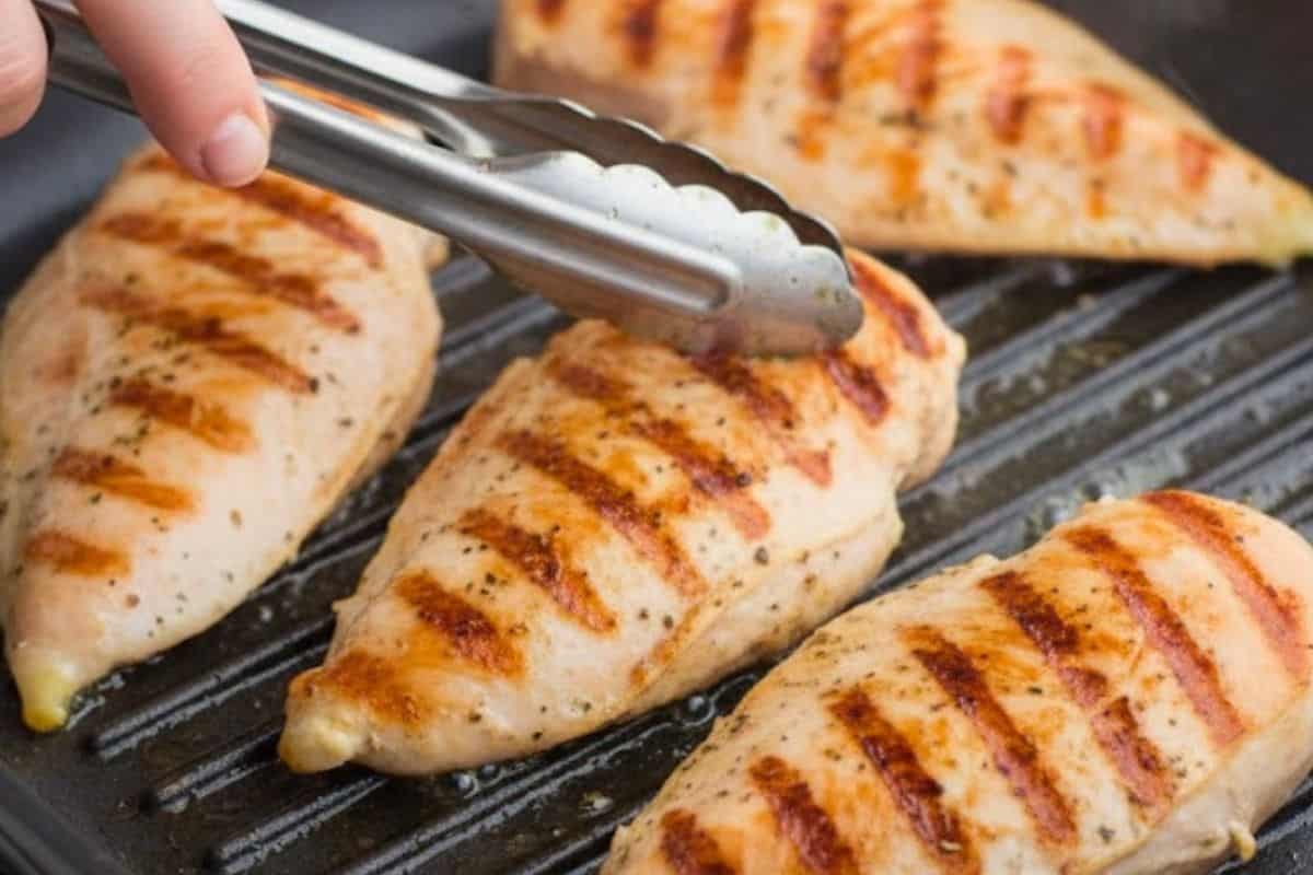 Heat a non-stick grill pan or skillet with a drizzle of olive oil. Cook chicken on both sides until golden - 5