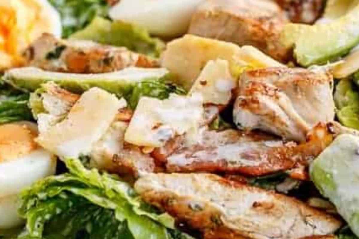 Add the chicken, bacon, eggs, and bread pieces to the lettuce. Pour over dressing - 10