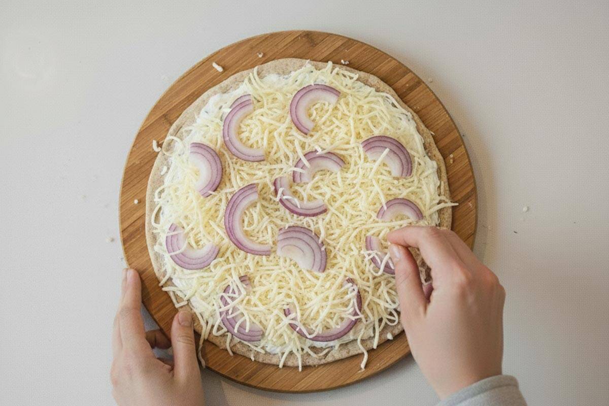 Added the onion and cheese on top of the base.