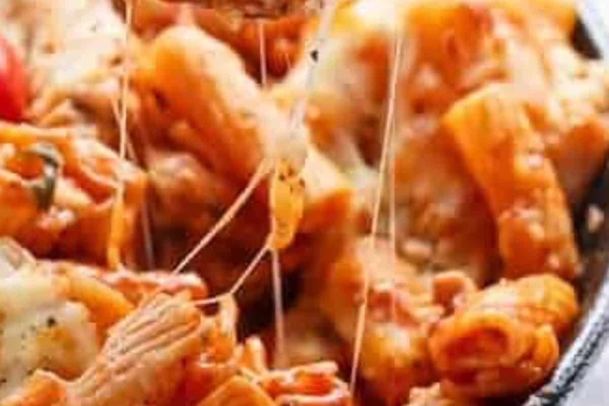 Transfer the pan to the preheated oven and bake for 10 minutes, or until the top is golden and the cheese has melted. Add dried oregano and basil on top before serving.