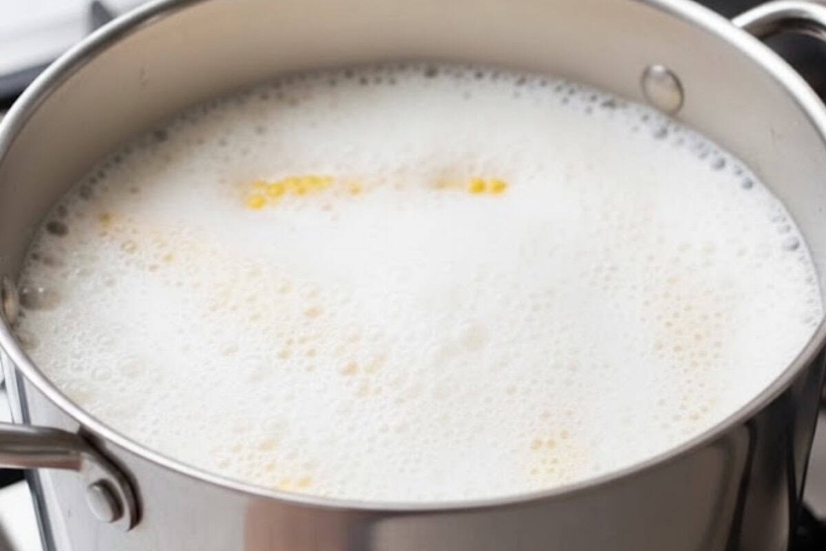 As the milk rises, lower heat. If it rises too quickly, remove the pot from the stove