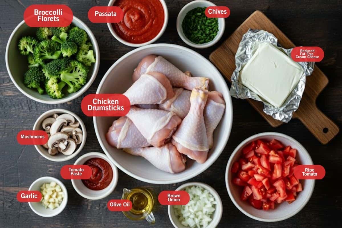 Flat lay photo of Ingredient shot of  broccoli florets. pasta, chives, reduced fat free cream cheese, ripe tomatoes, brown onion, olive oil, tomato paste, garlic, mushrooms, chicken drumstricks