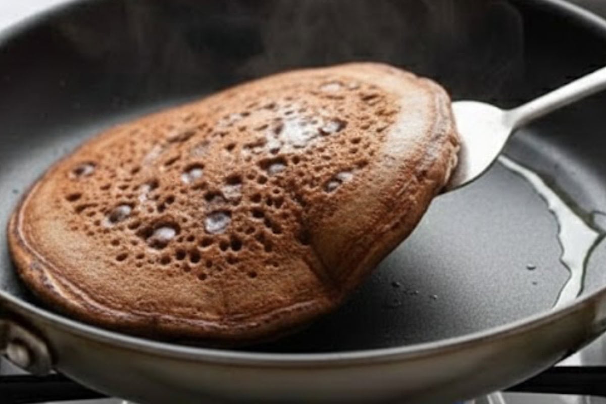 Let the pancakes cook until bubbles form on top and the edges look set