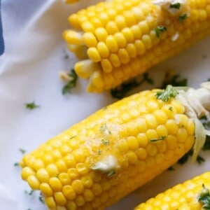 Corn On The Cob With Garlic Butter on a tray