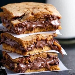Nutella Stuffed Salted Caramel Blondies stack on each other