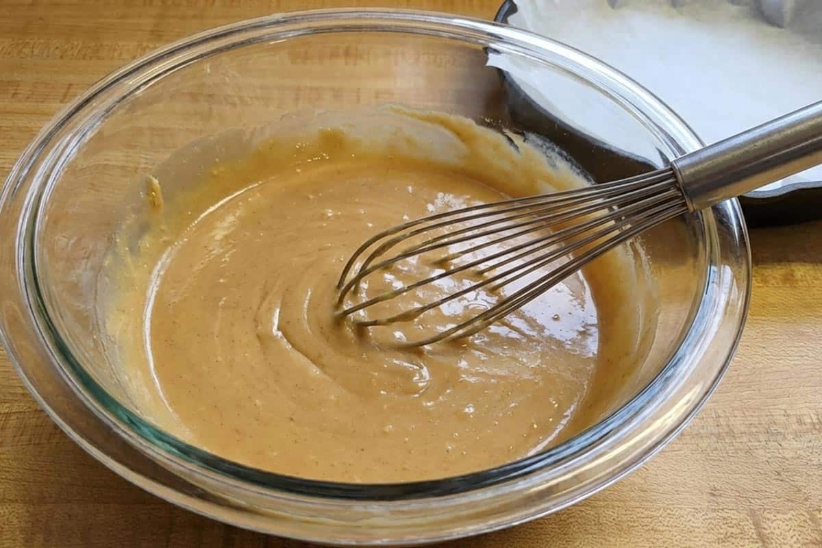 Whisked the melted butter, peanut butter, brown sugar, sugar, vanilla, and egg in a bowl. - 4