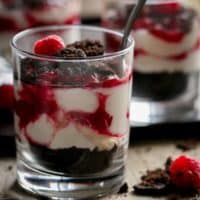 Raspberry Oreo No Bake Cheesecake Parfaits in a glass