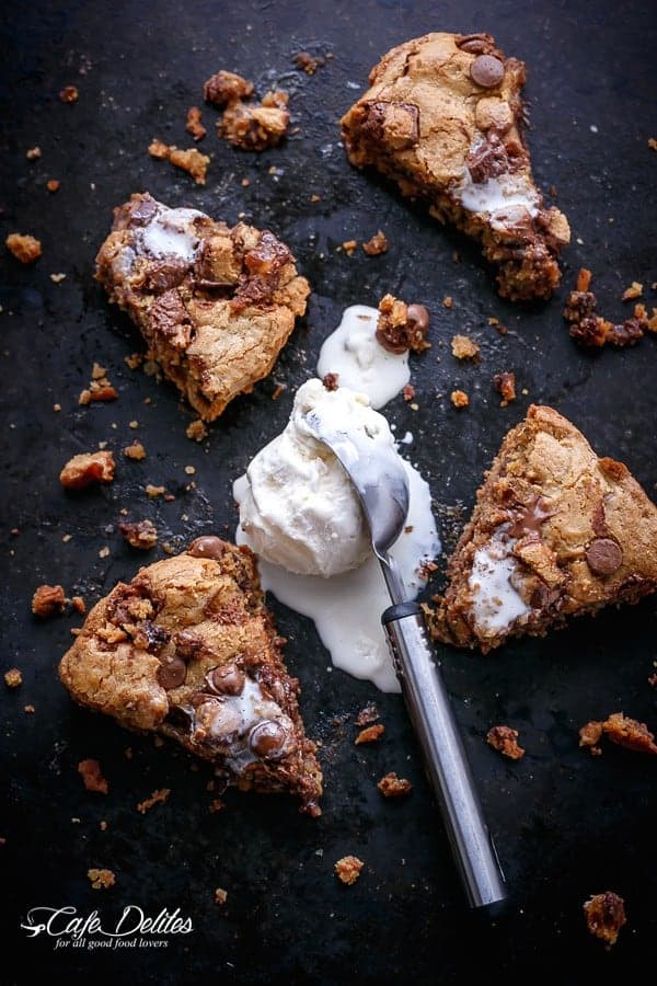 Reese's Nutella Stuffed Peanut Butter Chocolate Chip Deep Dish Skillet Cookie | https://cafedelites.com