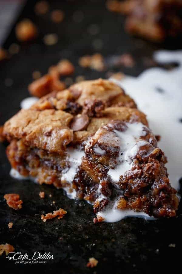 Reese's Nutella Stuffed Peanut Butter Chocolate Chip Deep Dish Skillet Cookie | https://cafedelites.com