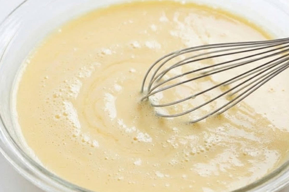 Combine the eggs, milk, sugar, salt and vanilla in a shallow dish and whisk until fully blended - 6